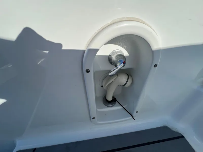 Slide: The Image of Water outlet on a 2014 Formula 350 Crossover Bowrider boat. - 21