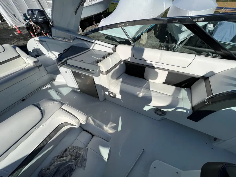 Slide: The Image of 2014 Formula 350 Crossover Bowrider interior with white seating and modern design. - 23