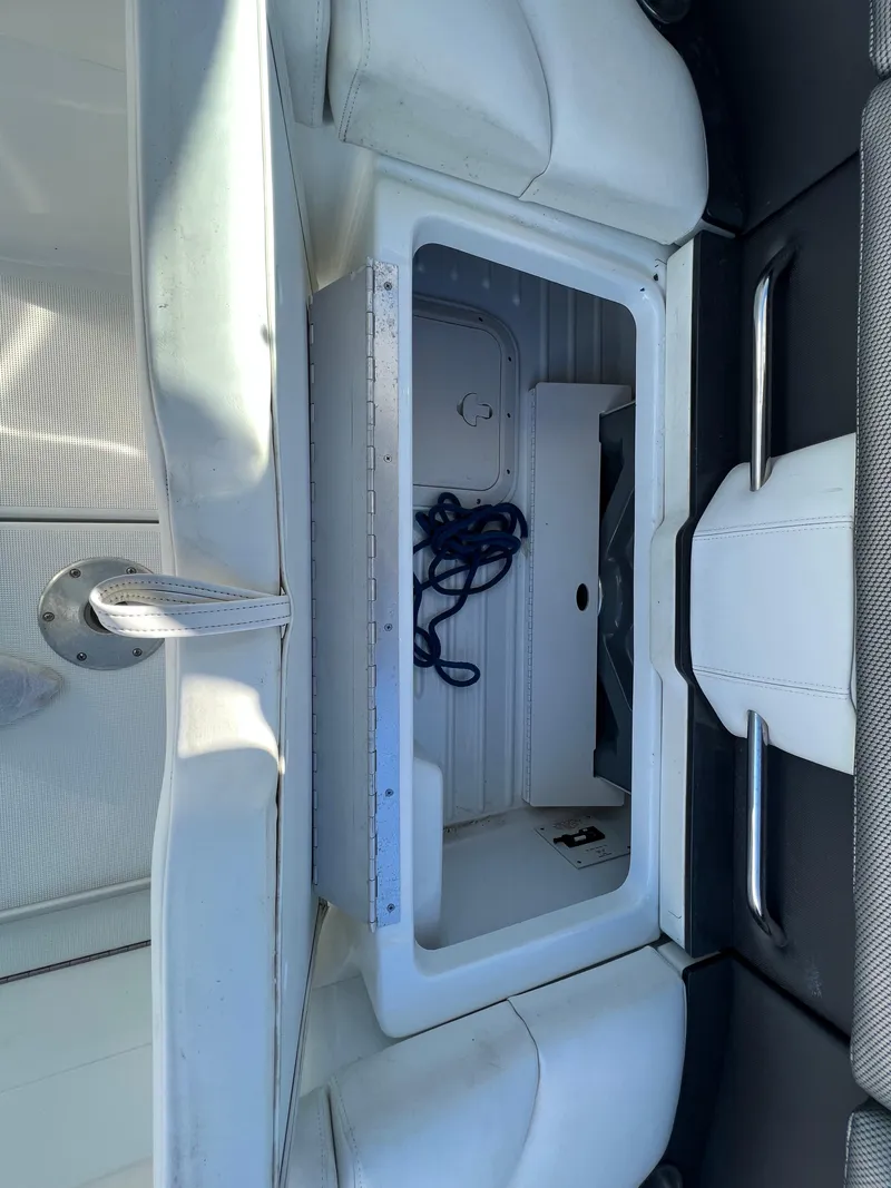 Slide: The Image of 2014 Formula 350 Crossover Bowrider storage compartment with rope. - 31