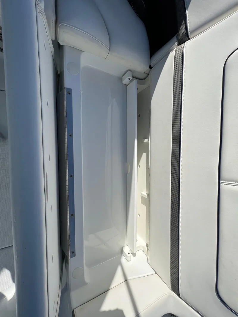 Slide: The Image of 2014 Formula 350 Crossover Bowrider interior seating and storage compartment. - 32