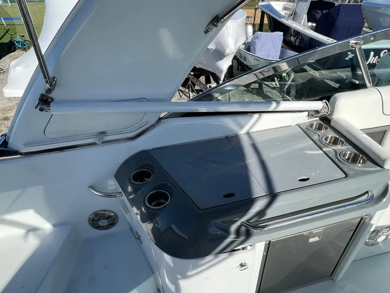 Slide: The Image of 2014 Formula 350 Crossover Bowrider cockpit with sink and storage. - 34