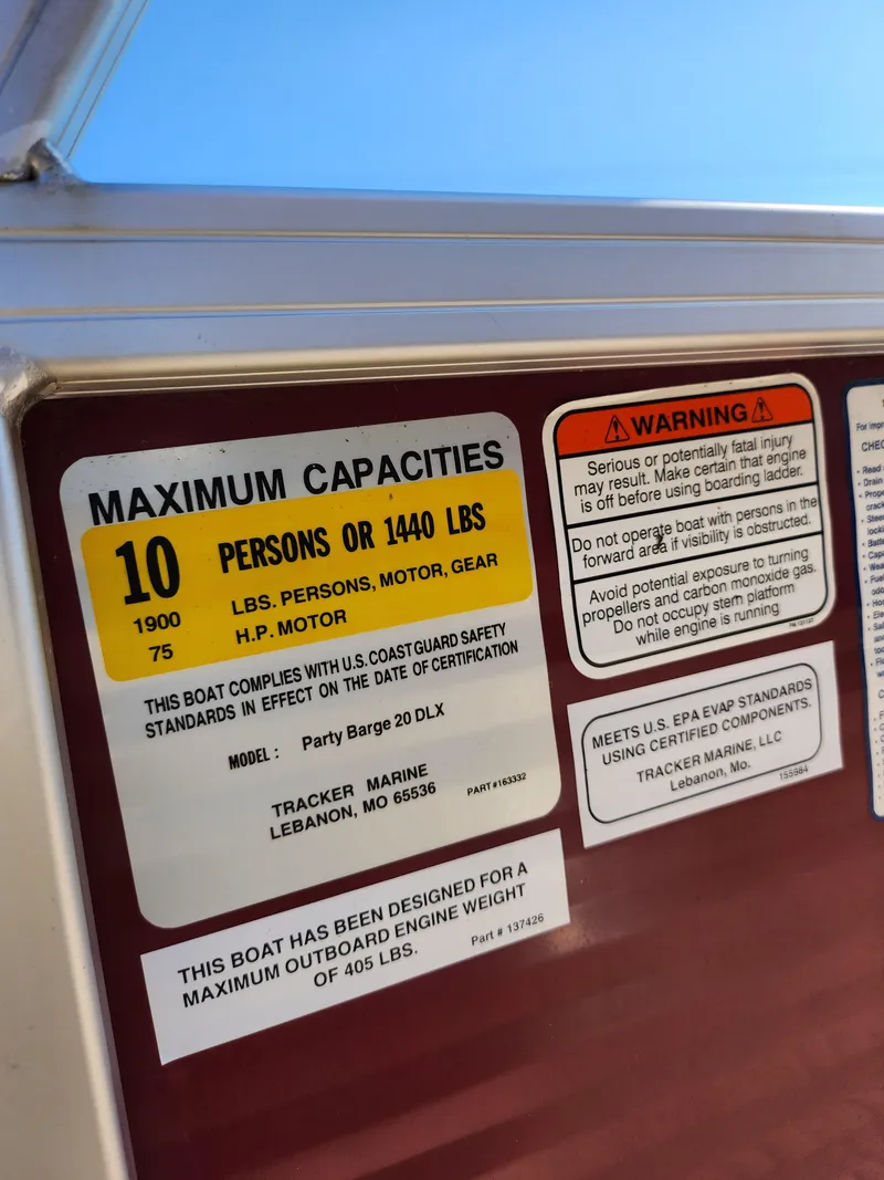 Slide: The Image of 2012 Sun Tracker Party Barge 20 DLX capacity and safety labels. - 22