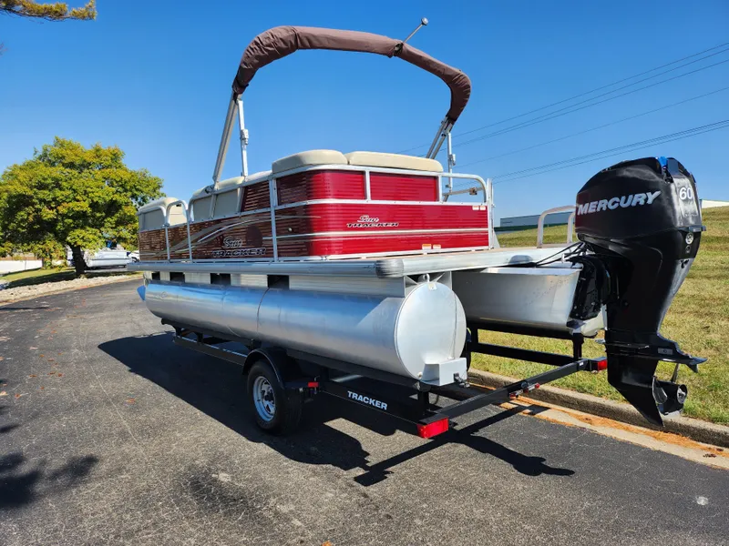 Slide: The Image of 2012 Sun Tracker Party Barge 20 DLX pontoon boat on trailer with Mercury 60 HP motor. - 4