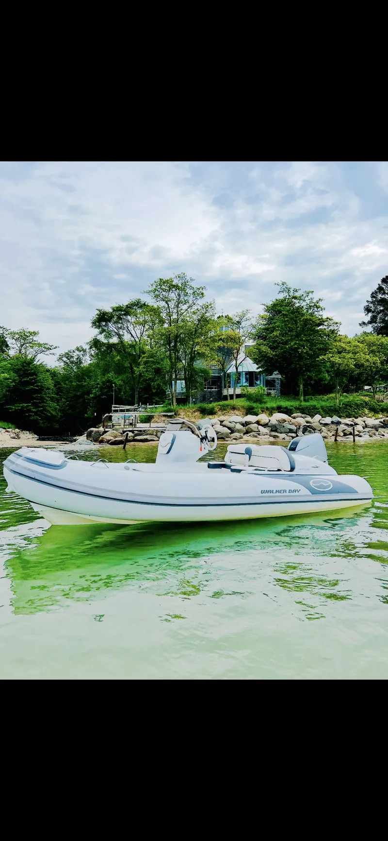 Slide: The Image of Walker Bay Venture 14 boat on calm water, 2021 model. - 27