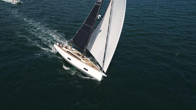 Slide: The Image of Sailing yacht Solaris 44, 2025 model, gliding on open sea with full sails. - 3