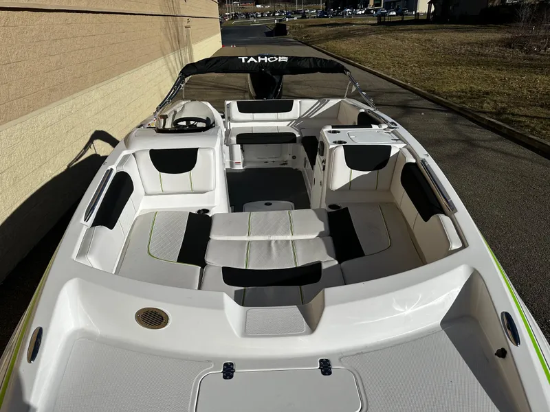 Slide: The Image of 2024 Tahoe 2150 boat with spacious seating and sleek design. - 6