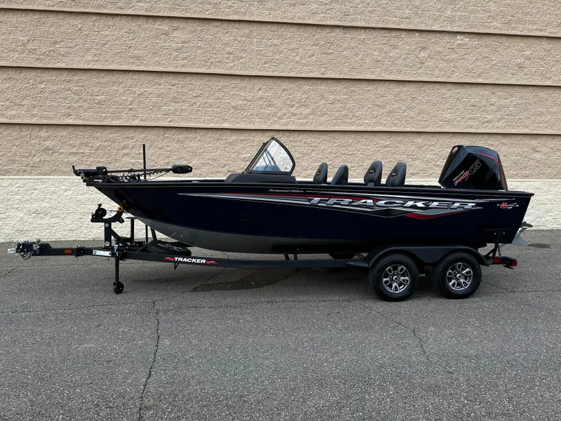 Slide: The Image of 2024 Tracker Targa V-19 WT boat on trailer, side view. - 8