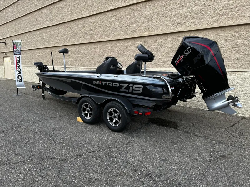 Slide: The Image of 2024 Nitro Z19 Pro fishing boat on trailer, side view. - 1