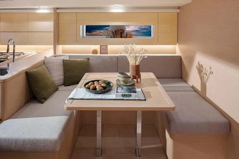 Slide: The Image of Luxurious interior of 2025 Solaris 40 yacht with cozy seating and elegant decor. - 6
