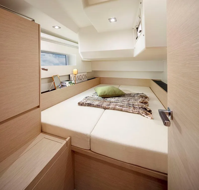 Slide: The Image of Cozy cabin interior of 2025 Solaris 40 yacht with modern design and soft lighting. - 9