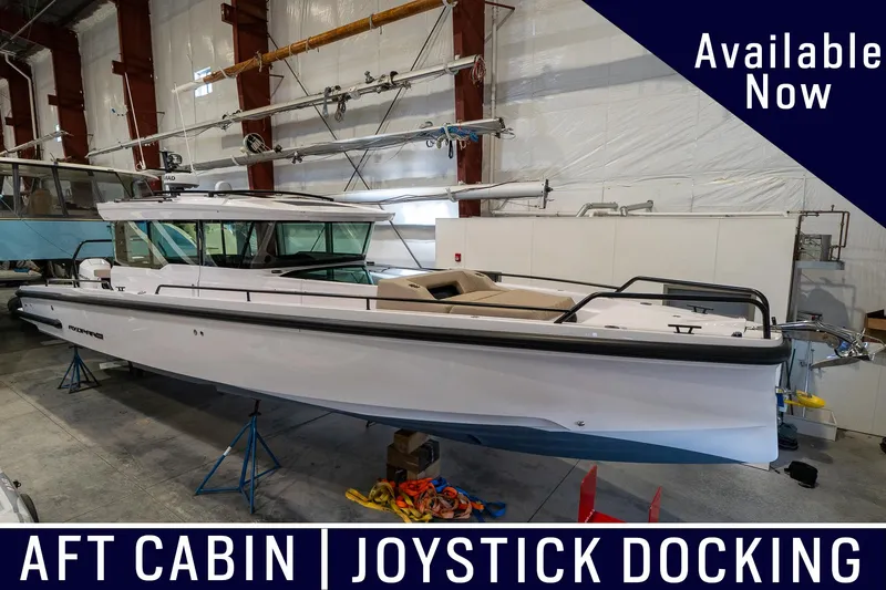 Slide: The Image of 2024 Axopar 37 Cross Cabin XC with aft cabin and joystick docking, available now. - 0