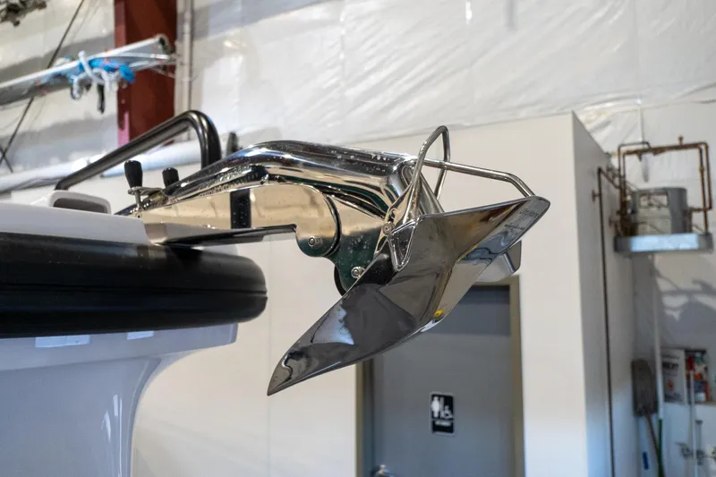 Slide: The Image of Close-up of the anchor on a 2024 Axopar 37 Cross Cabin XC boat. - 15