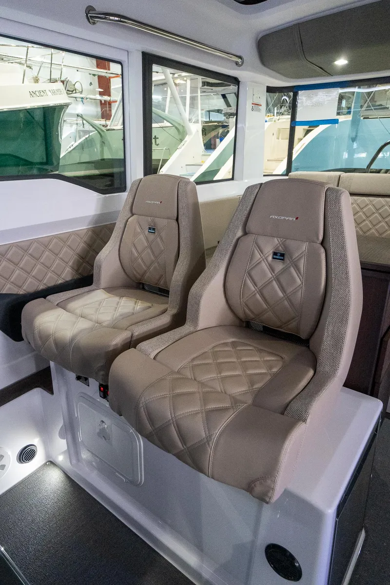 Slide: The Image of 2024 Axopar 37 Cross Cabin XC interior with luxurious seating - 25