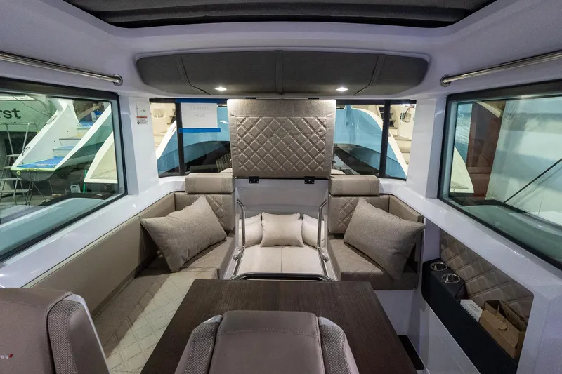 Slide: The Image of Luxurious interior of 2024 Axopar 37 Cross Cabin XC with plush seating and modern design. - 29