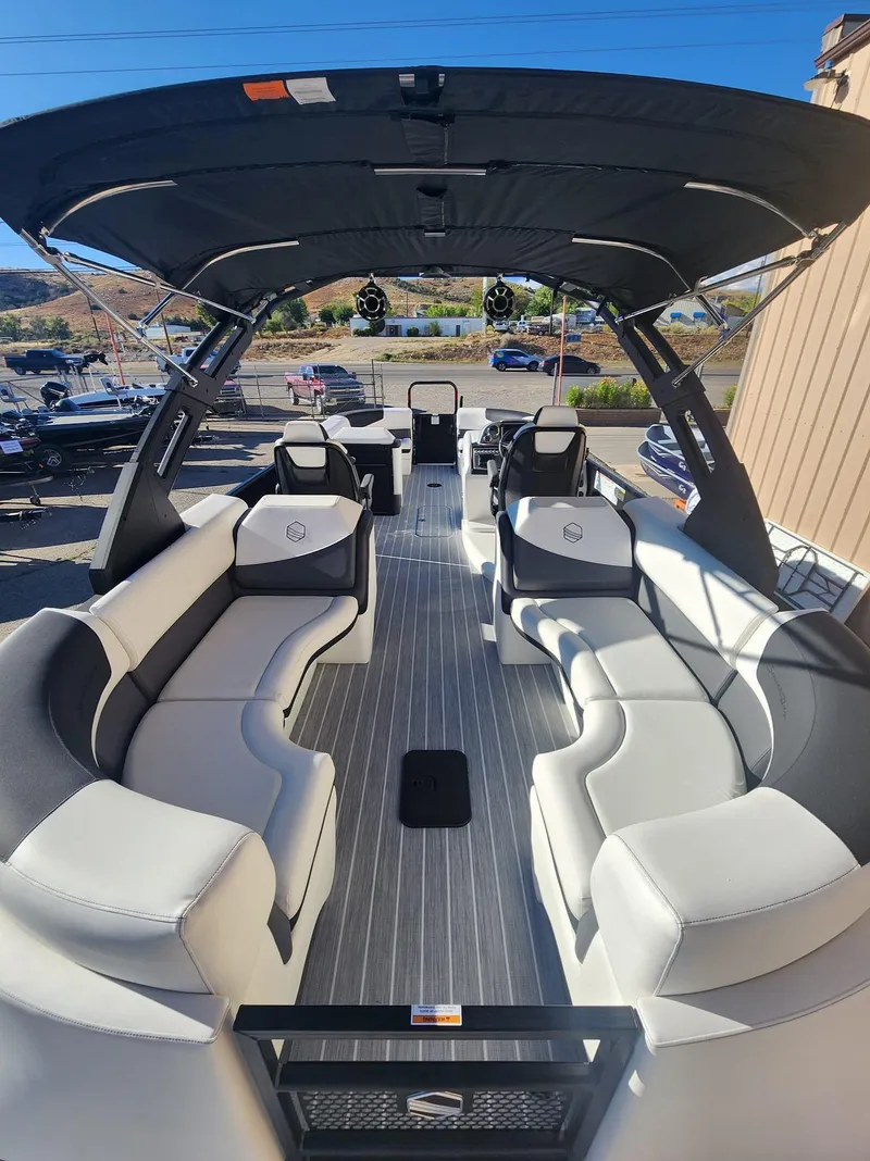 Slide: The Image of 2024 South Bay 525 RS Arch 3Plus Twin pontoon boat interior with luxurious seating. - 6