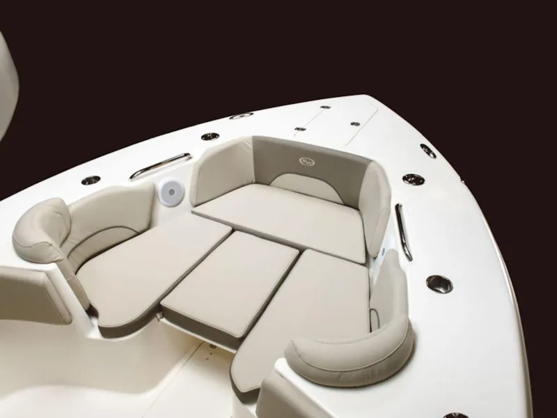 Slide: The Image of 2024 Key West 263 FS boat with cushioned seating area. - 6