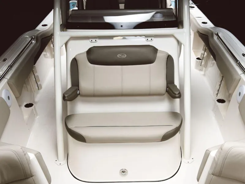 Slide: The Image of 2024 Key West 263 FS boat interior with cushioned seating and white finish. - 9