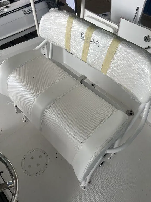 Slide: The Image of 2024 BlackJack 256 Bay boat seat with protective wrapping. - 28