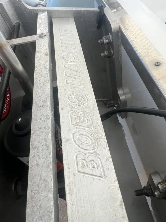 Slide: The Image of Bob's Machine component on 2024 BlackJack 256 Bay boat. - 8