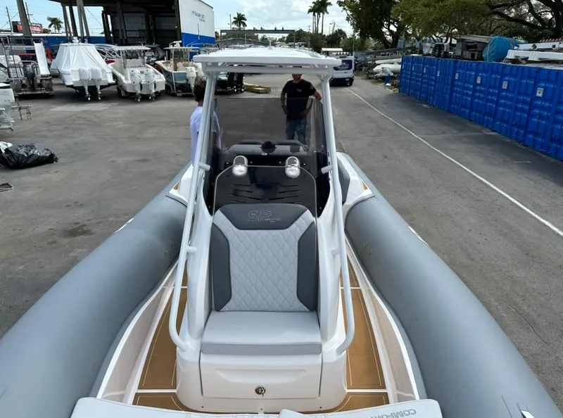 Slide: The Image of 2024 Sea Prop COMFORT 30 inflatable boat with gray and white seating. - 10