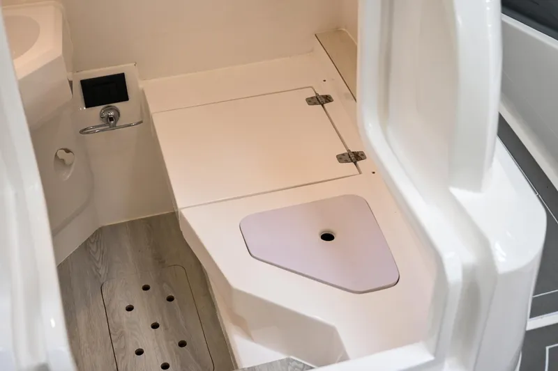 Slide: The Image of 2024 Sea Prop COMFORT 30 boat interior with modern bathroom and shower area. - 13