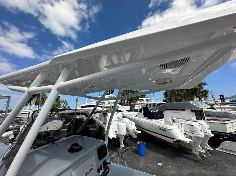 Slide: The Image of 2024 Sea Prop COMFORT 30 boat at marina, showcasing sleek design and modern features. - 8