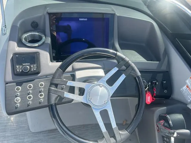 Slide: The Image of Luxurious seating on the 2023 Bennington 25 RFBWA Quad Bench Tritoon boat. - 11