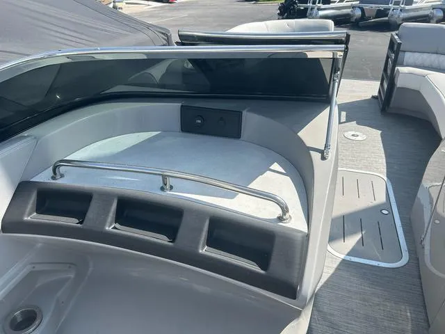 Slide: The Image of 2023 Bennington 25 RFBWA Tritoon boat interior with quad bench seating. - 16