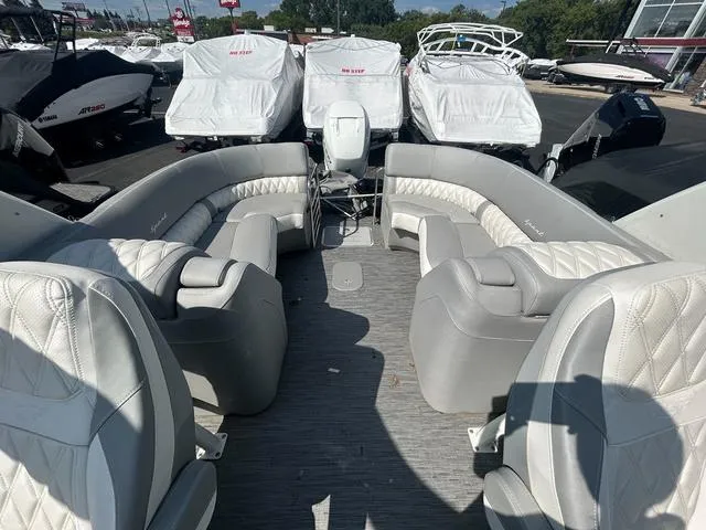 Slide: The Image of 2023 Bennington 25 RFBWA Tritoon with luxurious seating and modern design. - 18