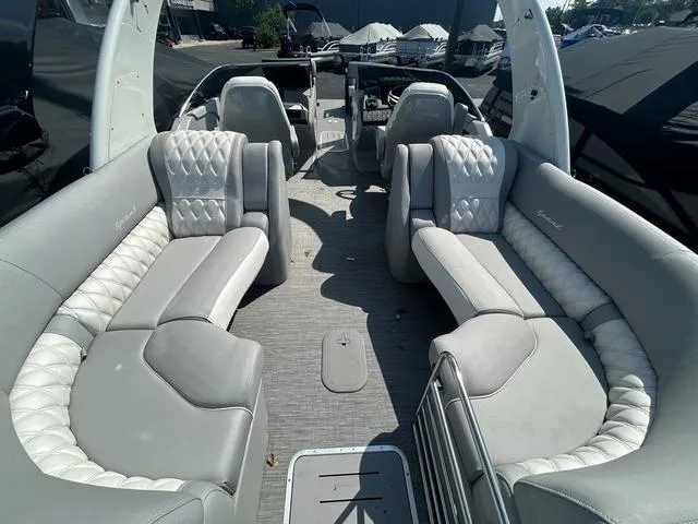 Slide: The Image of 2023 Bennington 25 RFBWA Tritoon with luxurious quad bench seating. - 20