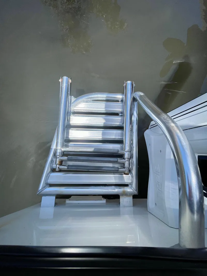 Slide: The Image of Aluminum boat ladder on a 2019 Rambo 27 model. - 14