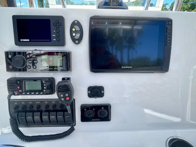 Slide: The Image of Boat control panel with Garmin and Yamaha displays, Rambo 27 model, 2019. - 3