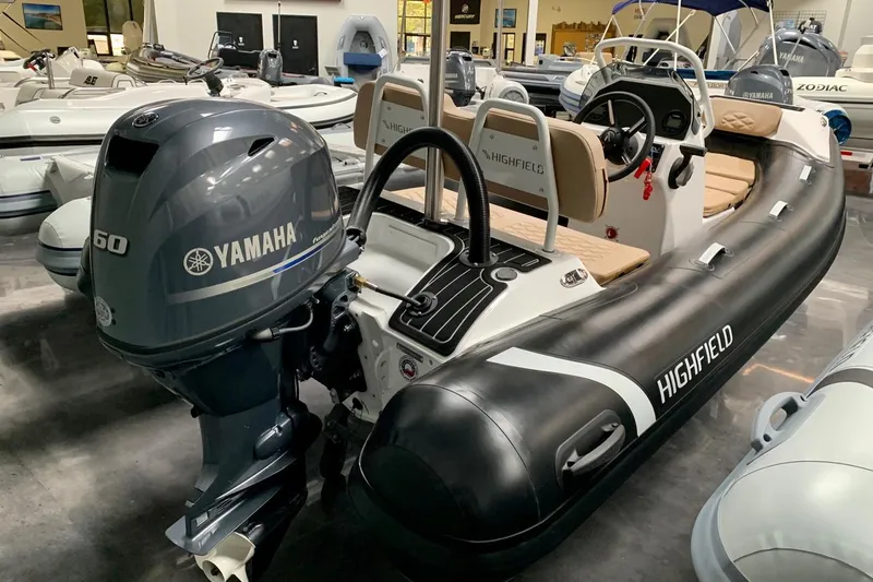 Slide: The Image of 2024 Highfield SP390 inflatable boat with Yamaha 60 outboard motor in showroom. - 3