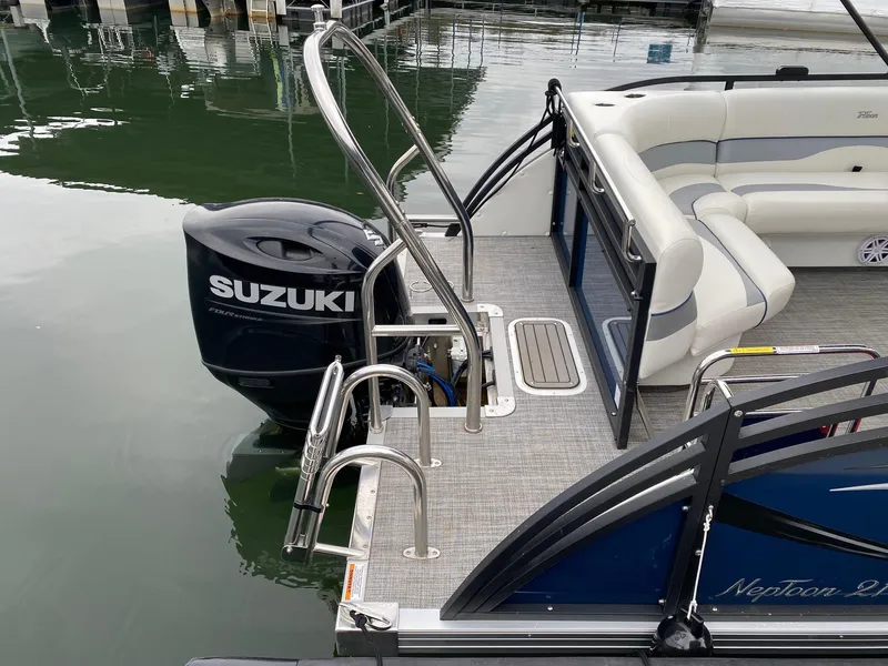 Slide: The Image of 2023 JC NEPTOON SPORT 21TT pontoon boat with Suzuki outboard motor. - 13