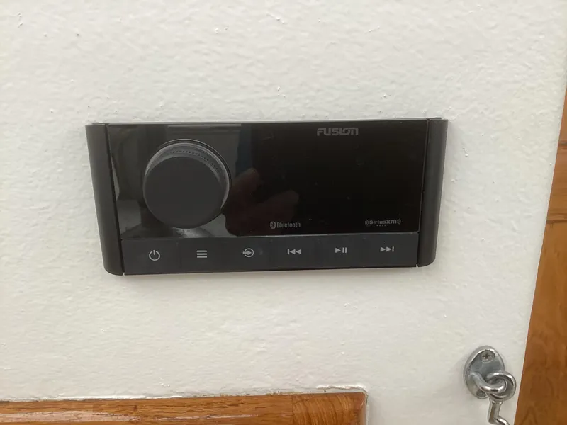 Slide: The Image of Fusion Bluetooth stereo system on a 1993 Ellis Downeast Hardtop boat. - 29