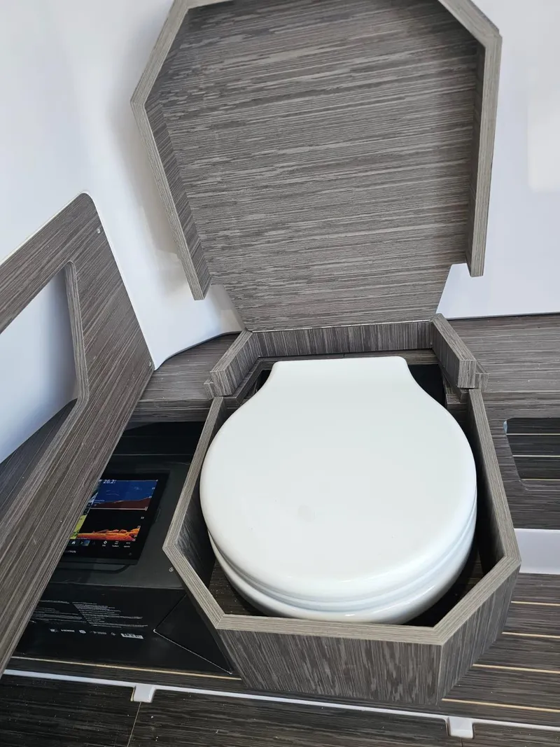 Slide: The Image of Built-in toilet in 2025 Ranieri CAYMAN 27.0 SPORT TOURING boat. - 38