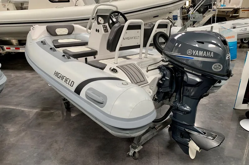 Slide: The Image of 2024 Highfield SP300 inflatable boat with Yamaha outboard motor in showroom. - 3