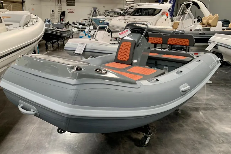 The Image of 2024 Highfield SP420 inflatable boat on display in showroom. - 0