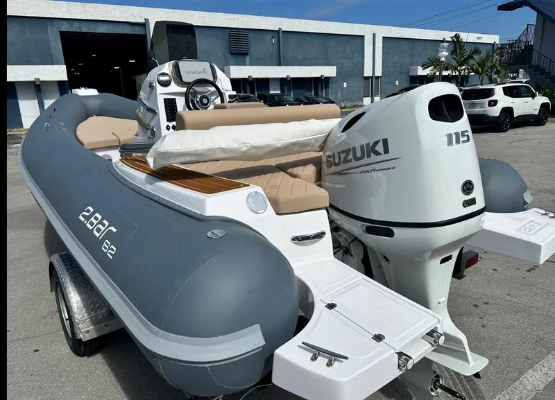 Slide: The Image of 2023 2 Bar 6.20 inflatable boat with Suzuki 115 outboard motor. - 10