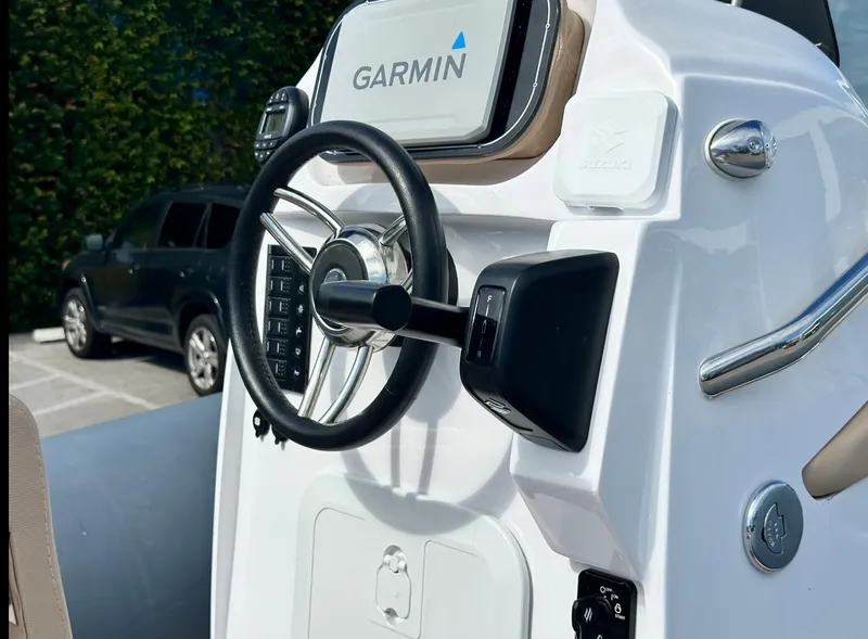 Slide: The Image of Control panel of 2023 2 Bar 6.20 boat with Garmin navigation system. - 8