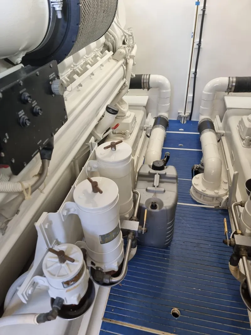 Slide: The Image of Engine room of a 2008 Bertram 670 Convertible yacht with mechanical components. - 34