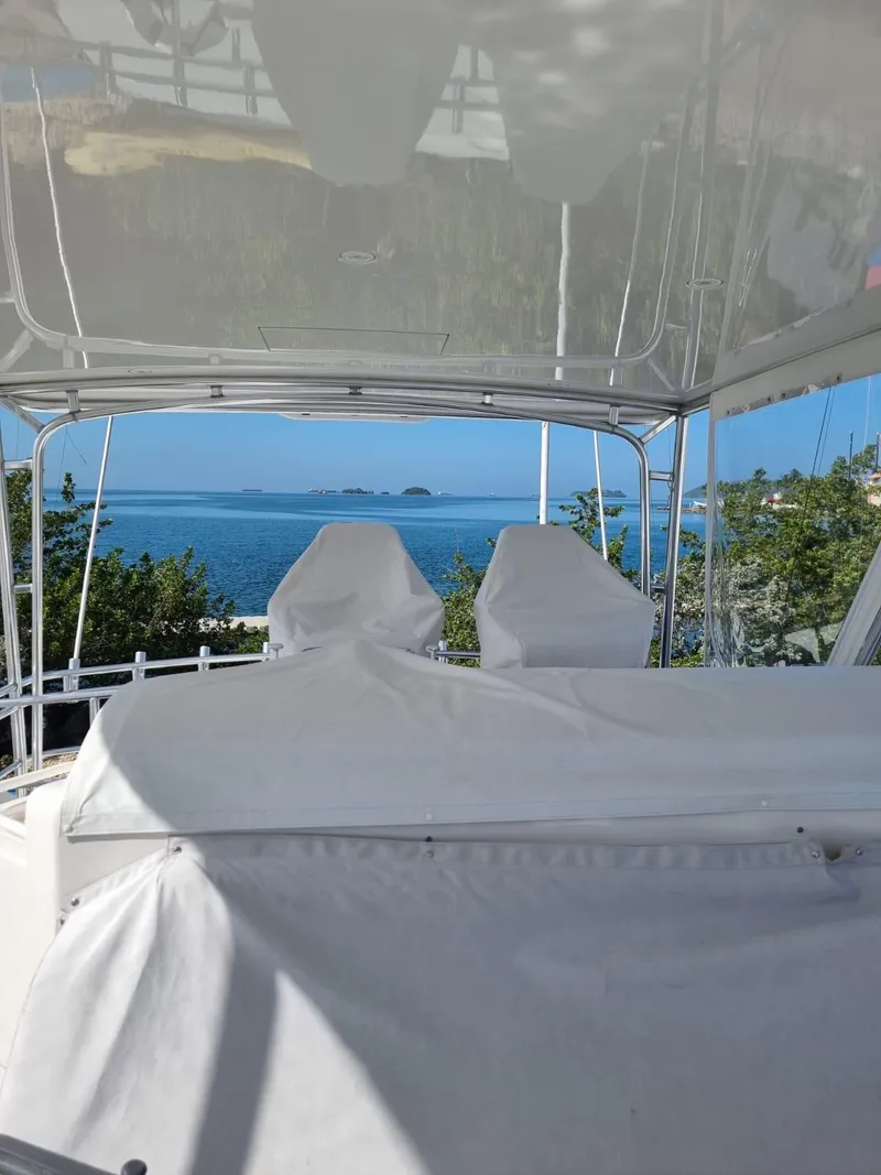 Slide: The Image of 2008 Bertram 670 Convertible yacht with ocean view. - 9