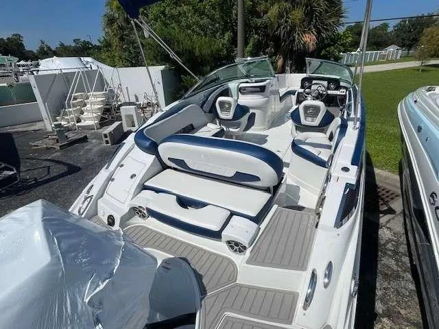 Slide: The Image of 2024 Crownline 250 XSS boat with sleek interior and modern design. - 3