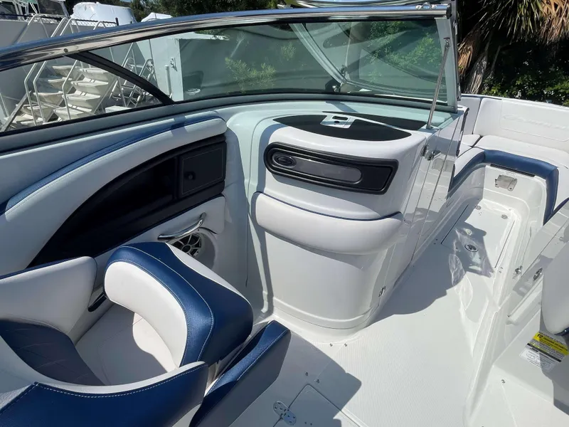 Slide: The Image of 2024 Crownline 250 XSS boat interior with sleek seating and modern design. - 8