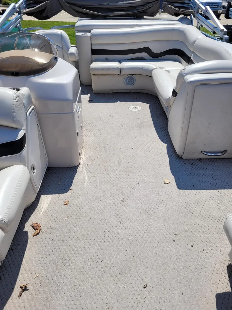 Slide: The Image of Interior of a 2008 Manitou 20 Oasis pontoon boat with spacious seating. - 15