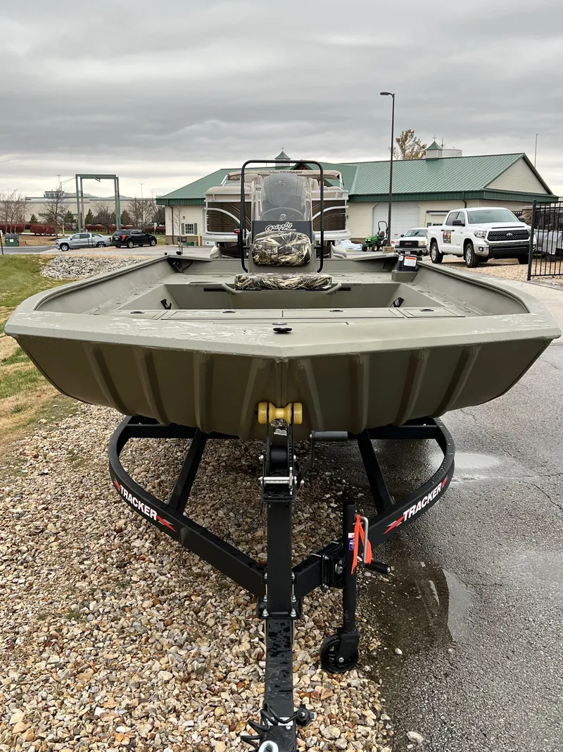 Slide: The Image of 2024 Tracker Grizzly 2072 CC boat on trailer, front view. - 2