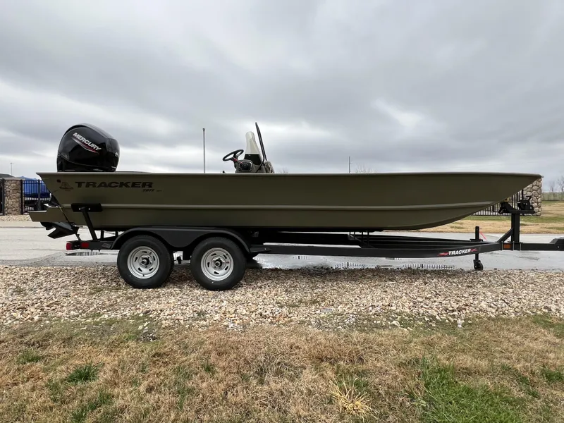 Slide: The Image of 2024 Tracker Grizzly 2072 CC boat on a trailer. - 4
