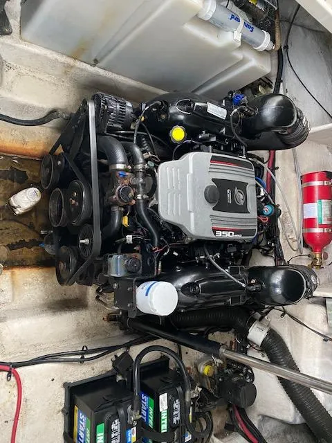 Slide: The Image of Engine compartment of a 2011 Sea Ray 280 Sundancer with a 350 MAG engine. - 17