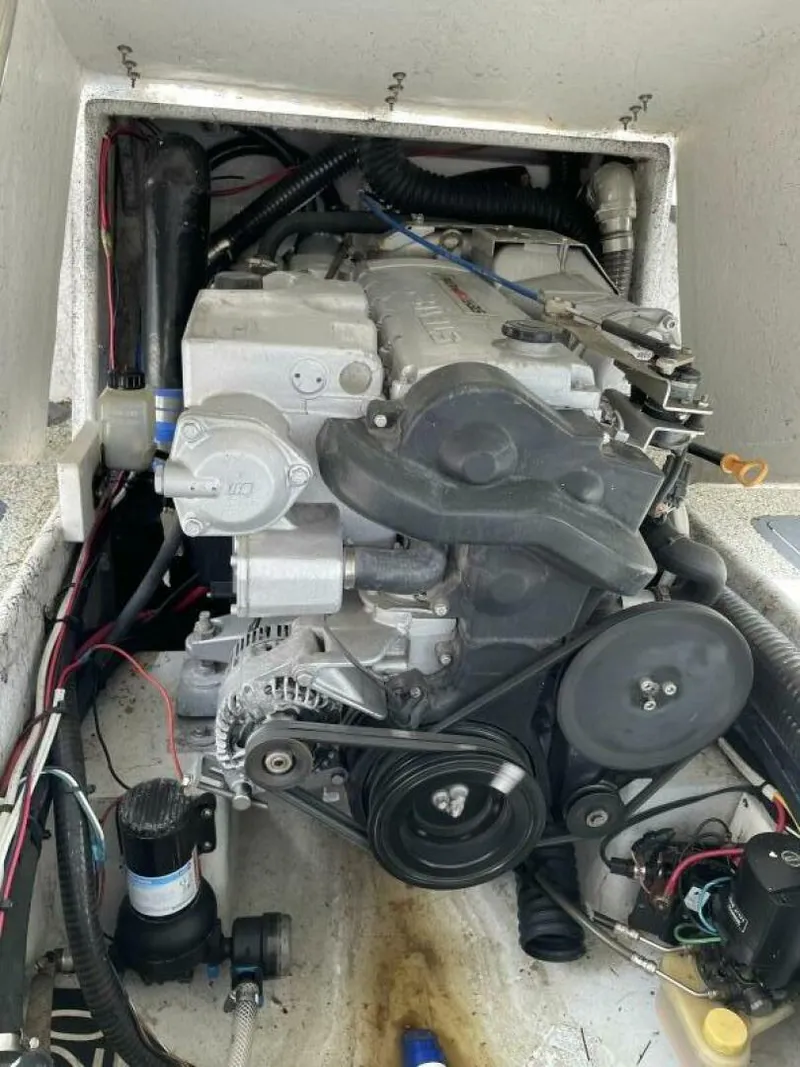 Slide: The Image of 1997 Custom 31 Center Console boat engine compartment. - 33