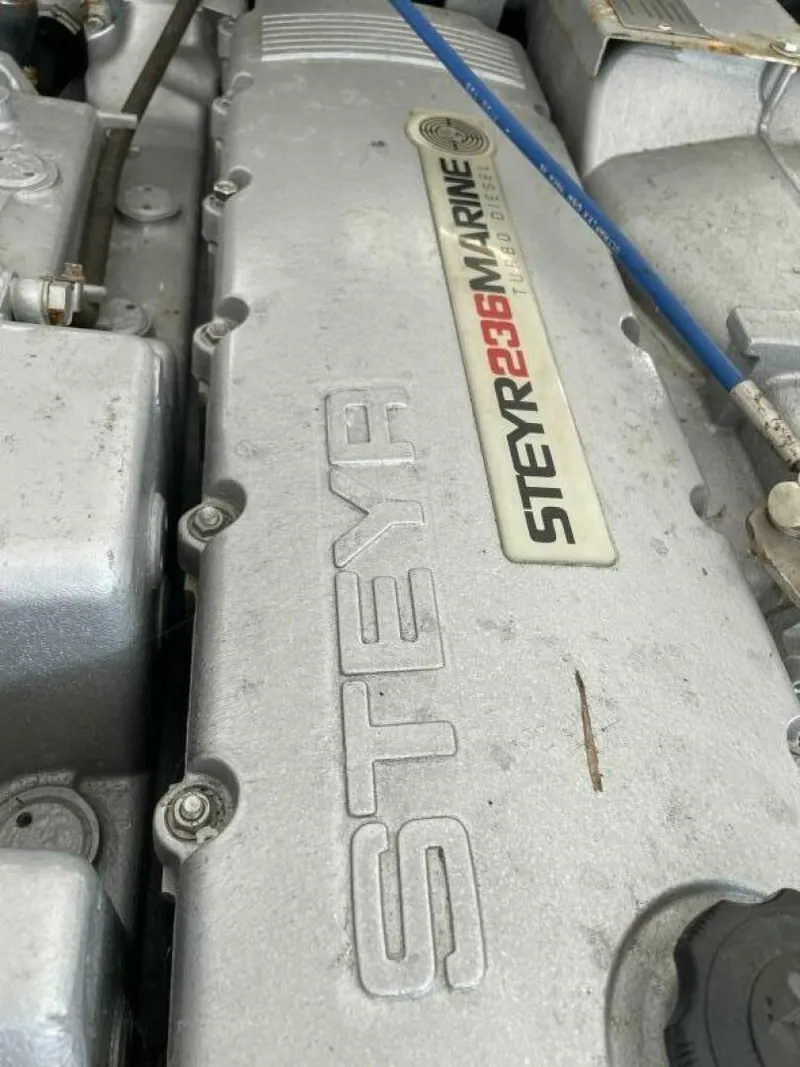 Slide: The Image of 1997 Custom 31 Center Console Steyr 236 Marine engine close-up - 36
